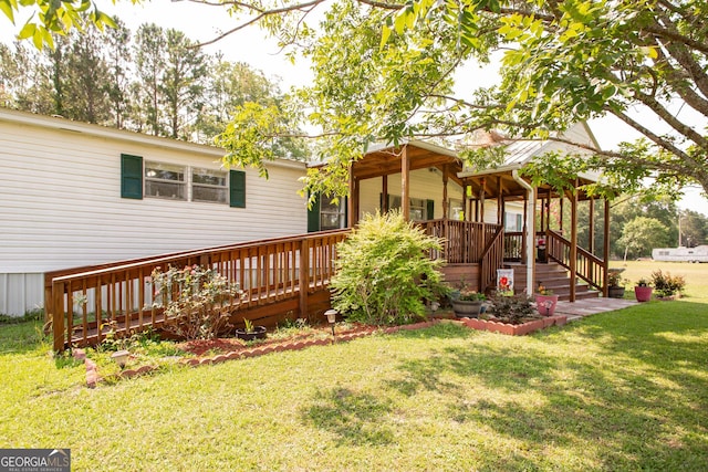 3564 Chapel Cir, Blackshear, GA 31516 - rear view of property featuring a yard