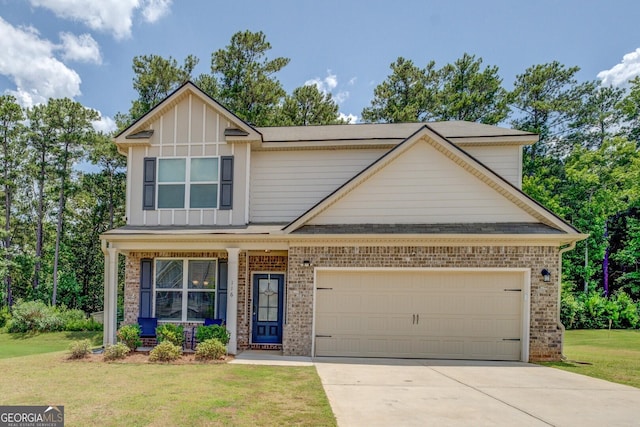 116 Sophie Cir, Locust Grove, GA 30248 - view of front of home with brick siding, a front lawn, concrete driveway, and an attached garage