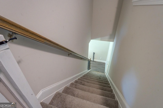 116 Sophie Cir, Locust Grove, GA 30248 - staircase featuring baseboards and carpet floors
