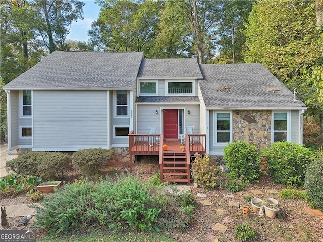 2653 Partridge Trl, Duluth, GA 30097 - split level home featuring a deck, roof with shingles, and stone siding