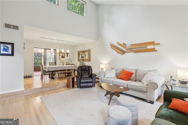 2653 Partridge Trl, Duluth, GA 30097 - living room with wood finished floors and a high ceiling