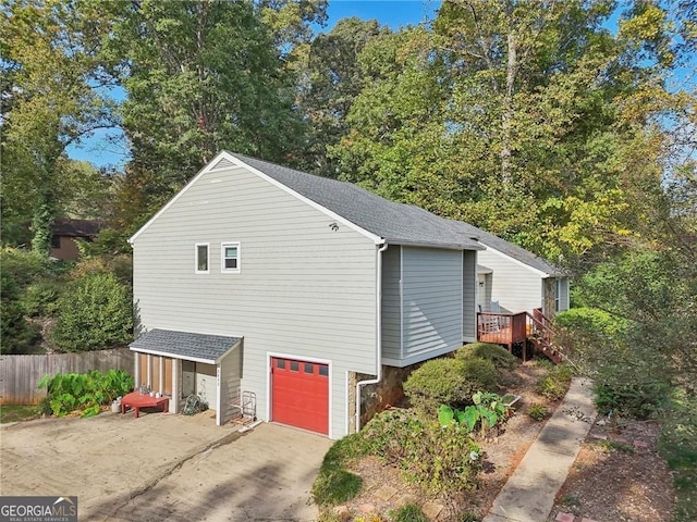 2653 Partridge Trl, Duluth, GA 30097 - view of home's exterior featuring a shingled roof, concrete driveway, and a garage