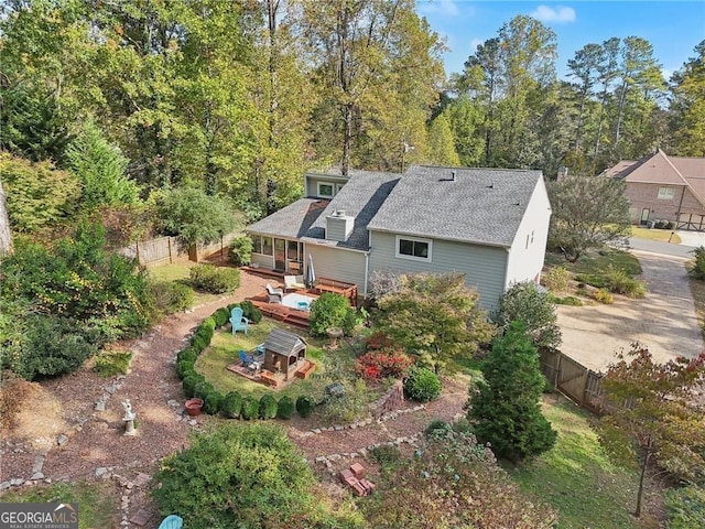 2653 Partridge Trl, Duluth, GA 30097 - rear view of house with a deck, a fenced backyard, and a shingled roof