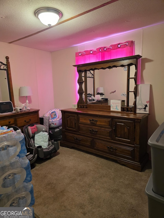 201 Rogers St, Mcdonough, GA 30253 - carpeted bedroom with a textured ceiling