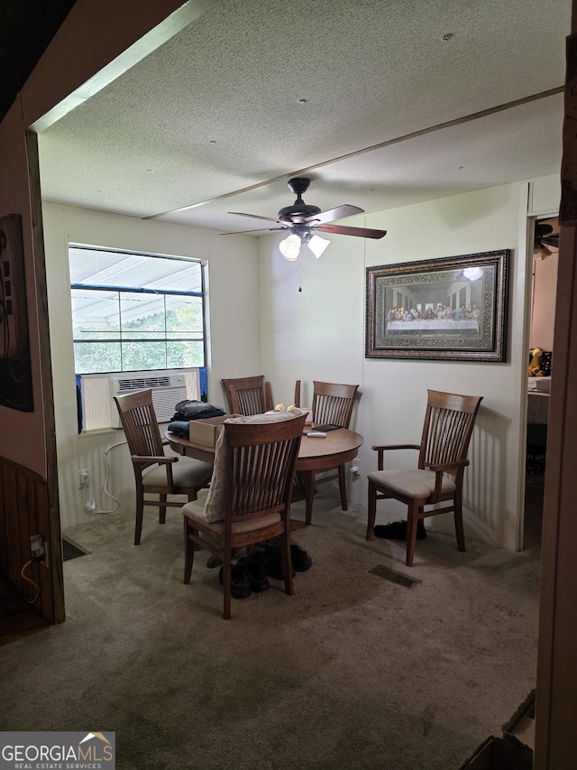 201 Rogers St, Mcdonough, GA 30253 - dining space featuring carpet, ceiling fan, cooling unit, and a textured ceiling