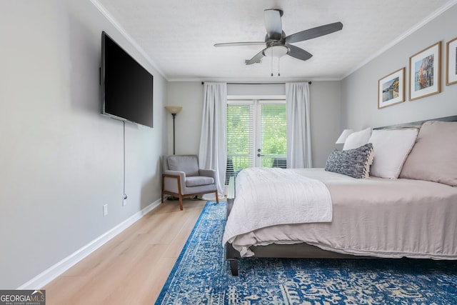 9 Saint Claire Ln NE, Atlanta, GA 30324 - bedroom with access to exterior, wood finished floors, ornamental molding, and a ceiling fan