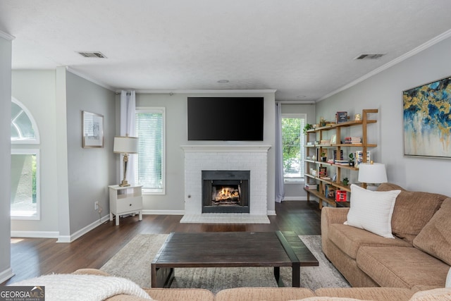 9 Saint Claire Ln NE, Atlanta, GA 30324 - living room featuring wood finished floors, ornamental molding, and a fireplace
