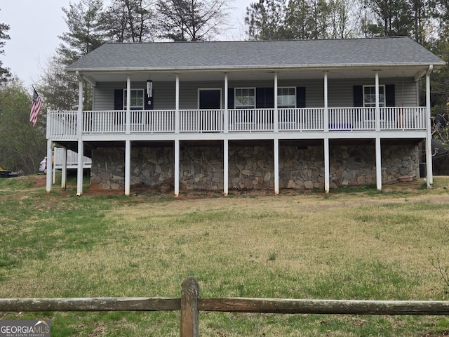 104 View St, Clarkesville, GA 30523 - view of front facade with stone siding, a front yard, and roof with shingles