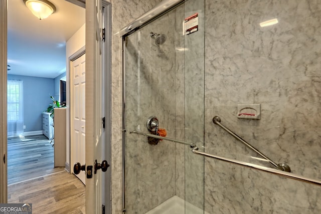 104 View St, Clarkesville, GA 30523 - bathroom with wood finished floors and a marble finish shower
