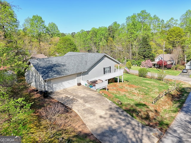 104 View St, Clarkesville, GA 30523 - view of front facade featuring driveway, a garage, and a front lawn