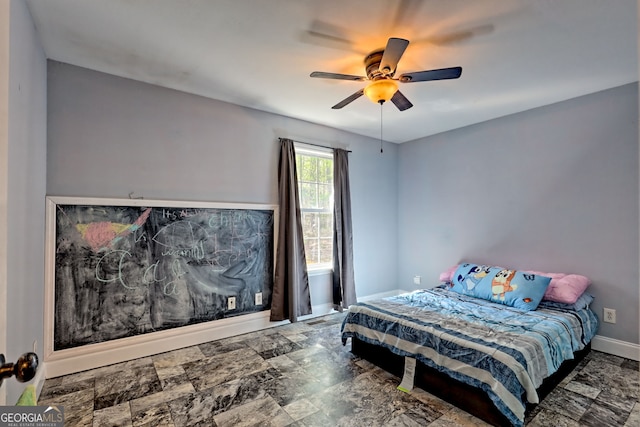 104 View St, Clarkesville, GA 30523 - bedroom featuring ceiling fan and stone finish flooring
