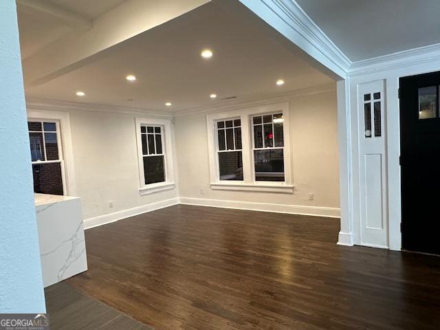 1134 Donnelly Ave SW, Atlanta, GA 30310 - unfurnished living room with crown molding, dark wood-style floors, and recessed lighting