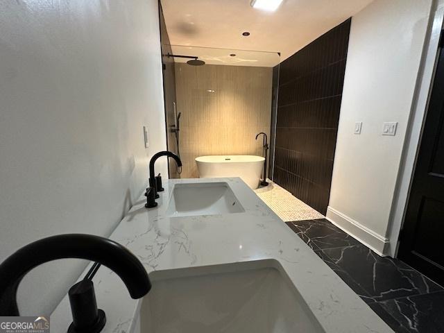 1134 Donnelly Ave SW, Atlanta, GA 30310 - full bath with a freestanding tub, marble finish floors, and a shower