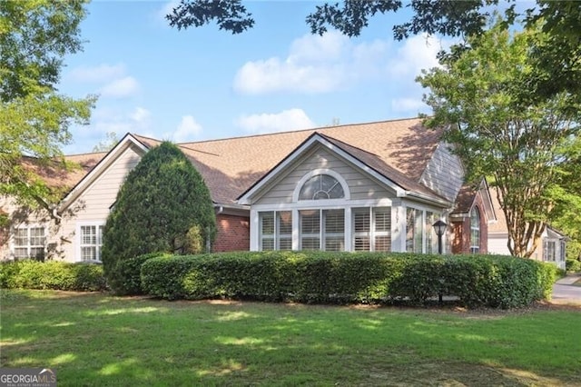 3707 Vineyards Lake Cir NW Unit 22, Kennesaw, GA 30144 - back of property with a yard and brick siding