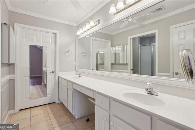 3707 Vineyards Lake Cir NW Unit 22, Kennesaw, GA 30144 - full bath featuring ceiling fan, double vanity, tile patterned flooring, an enclosed shower, and crown molding