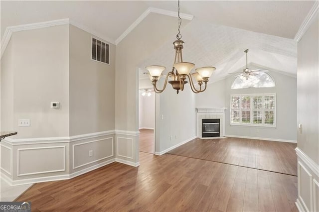 3707 Vineyards Lake Cir NW Unit 22, Kennesaw, GA 30144 - unfurnished living room with lofted ceiling, wood finished floors, ceiling fan, a chandelier, and a fireplace