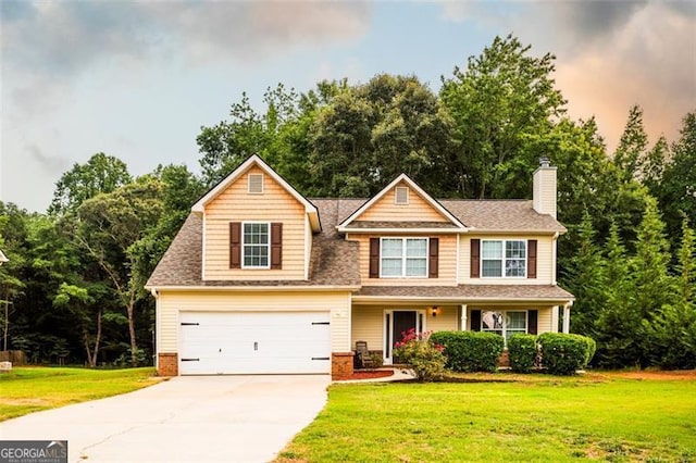 1643 Trey Ln, Winder, GA 30680 - view of front of property featuring concrete driveway, a front yard, a garage, a chimney, and roof with shingles
