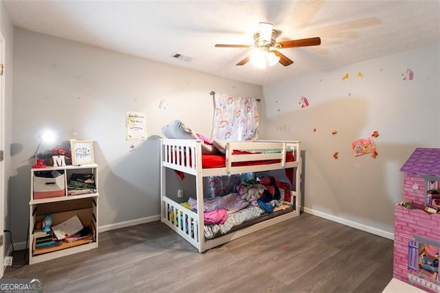 1643 Trey Ln, Winder, GA 30680 - bedroom with wood finished floors and a ceiling fan