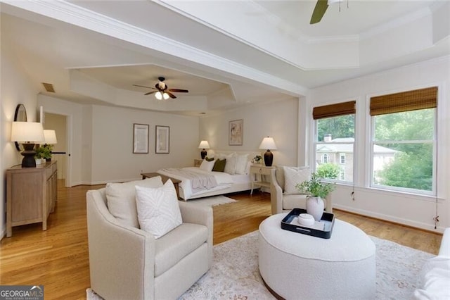 360 Hannaford Dr, Roswell, GA 30075 - bedroom featuring a tray ceiling, light wood-type flooring, and crown molding