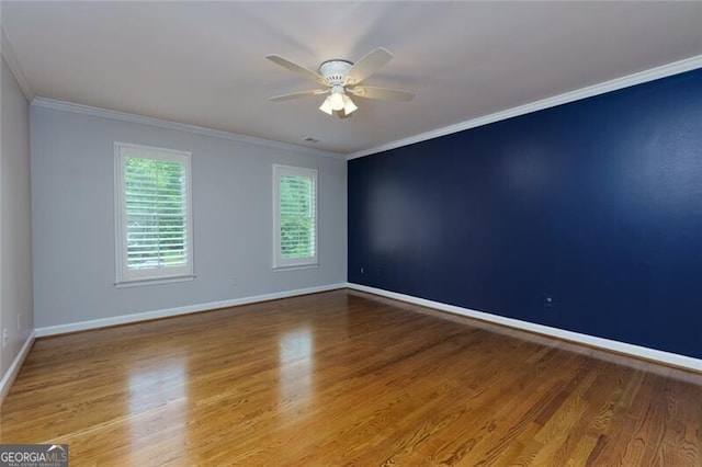 360 Hannaford Dr, Roswell, GA 30075 - spare room featuring a ceiling fan, wood finished floors, and crown molding