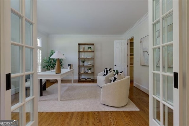 360 Hannaford Dr, Roswell, GA 30075 - sitting room with french doors, crown molding, and wood finished floors