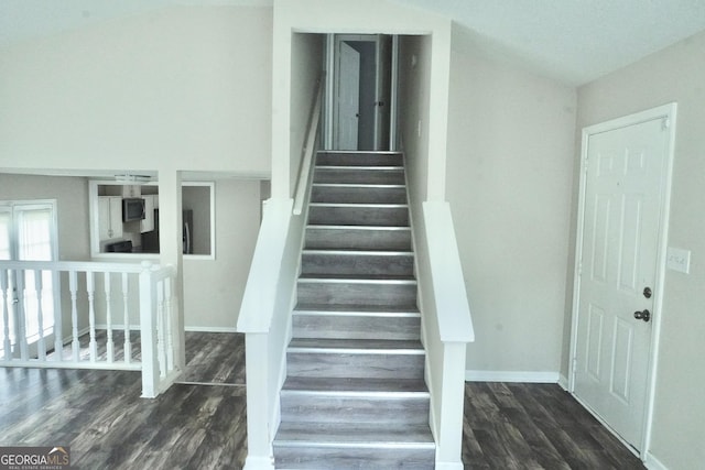 5761 Antelope Trl, Atlanta, GA 30349 - staircase with wood finished floors and baseboards