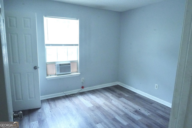 5761 Antelope Trl, Atlanta, GA 30349 - empty room featuring wood finished floors and cooling unit