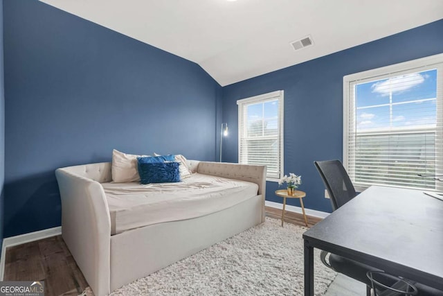 3641 Princeton Ave, Atlanta, GA 30337 - bedroom with lofted ceiling and wood finished floors