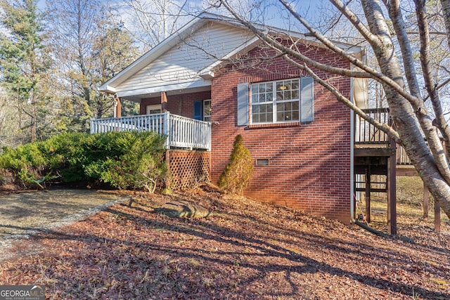 110 Clearview St, Clarkesville, GA 30523 - view of front of property with brick siding, crawl space, a porch, and stairway
