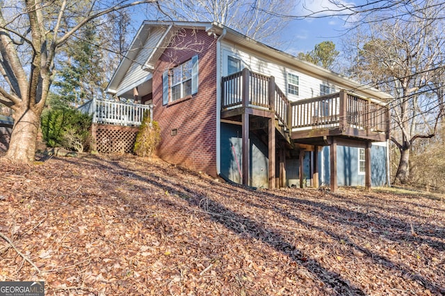 110 Clearview St, Clarkesville, GA 30523 - rear view of property with a deck and brick siding