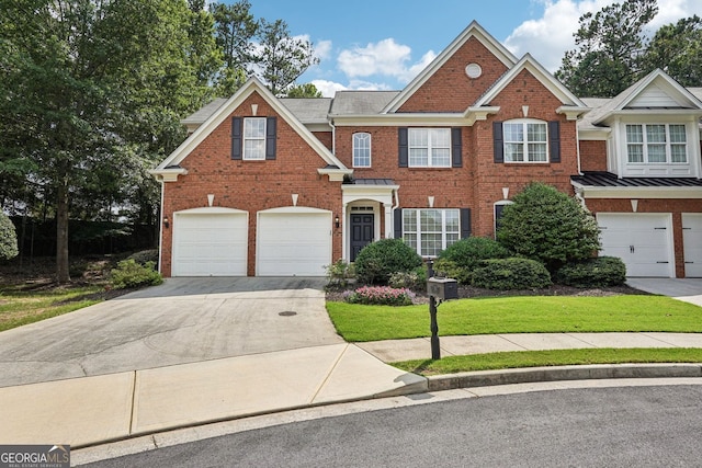 25 Hampreston Ct, Alpharetta, GA 30022 - view of front of house featuring concrete driveway, brick siding, a garage, and a front lawn