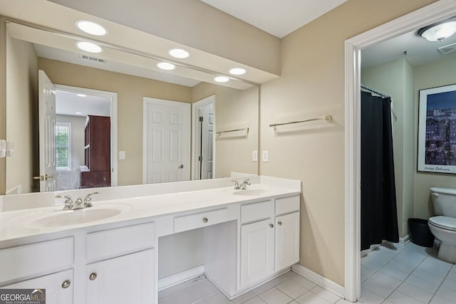 25 Hampreston Ct, Alpharetta, GA 30022 - bathroom featuring tile patterned flooring, double vanity, recessed lighting, and curtained shower
