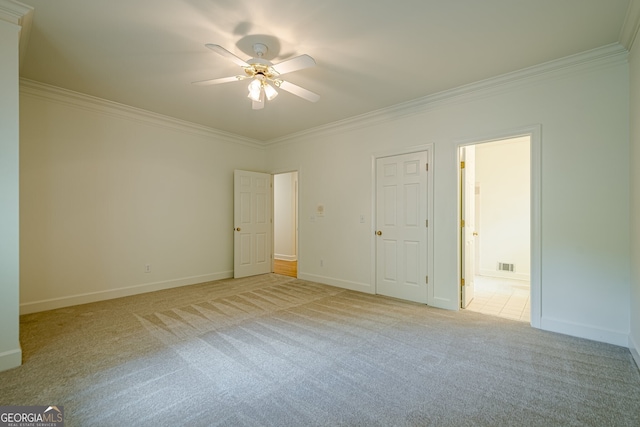 2814 Tanner Lake Trl NW, Marietta, GA 30064 - unfurnished bedroom with ornamental molding, light carpet, ensuite bathroom, and a ceiling fan