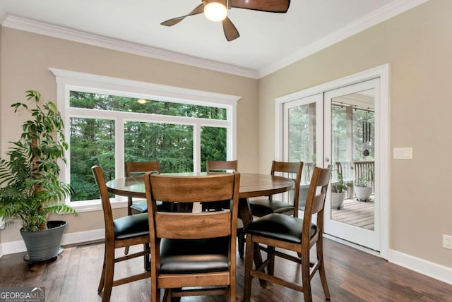 4882 Rabbit Farm Rd, Loganville, GA 30052 - dining room with a ceiling fan, dark wood-type flooring, and crown molding