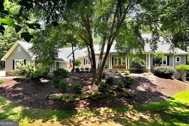 4882 Rabbit Farm Rd, Loganville, GA 30052 - ranch-style home featuring covered porch