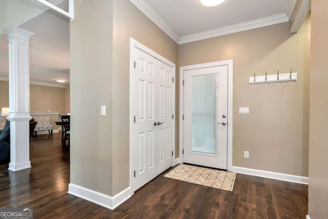 4882 Rabbit Farm Rd, Loganville, GA 30052 - entryway with ornate columns, wood finished floors, and crown molding