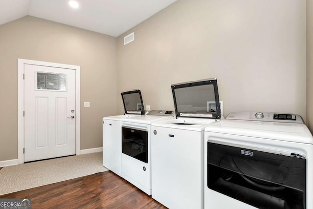 4882 Rabbit Farm Rd, Loganville, GA 30052 - laundry room featuring washing machine and clothes dryer, dark wood-style floors, and recessed lighting