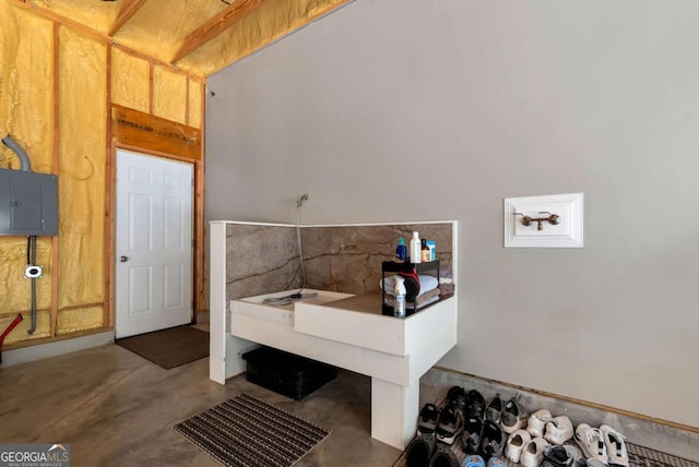 4882 Rabbit Farm Rd, Loganville, GA 30052 - bathroom with electric panel and concrete flooring
