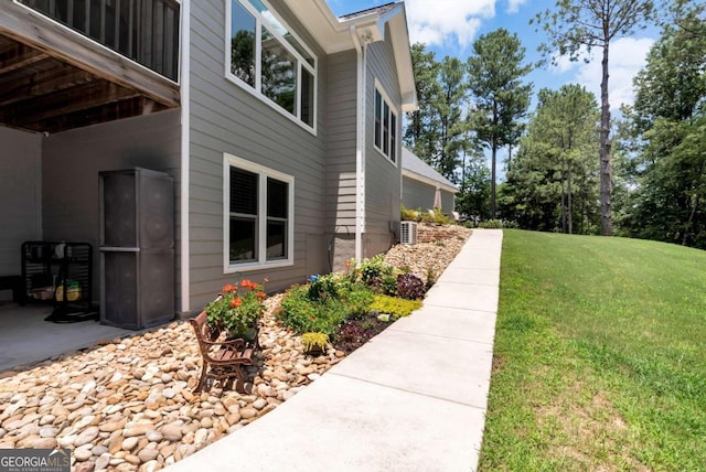 4882 Rabbit Farm Rd, Loganville, GA 30052 - view of property exterior featuring a yard and a cooling unit