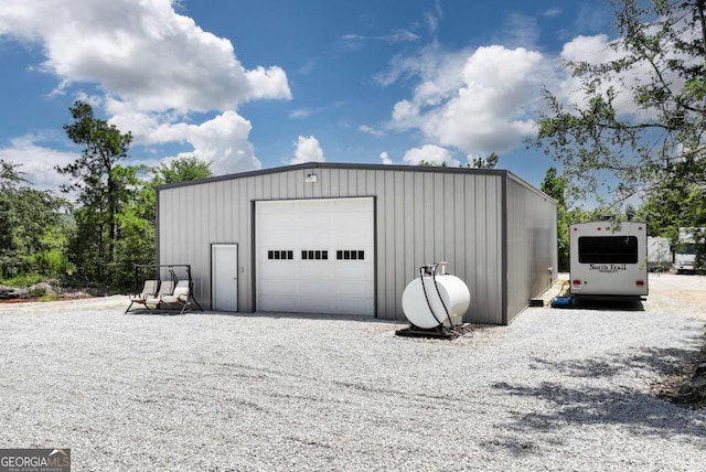 4882 Rabbit Farm Rd, Loganville, GA 30052 - detached garage with gravel driveway