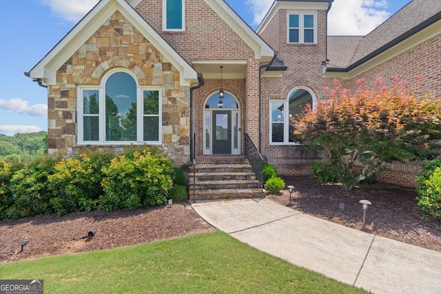 387 Gold Bullion Dr E, Dawsonville, GA 30534 - entrance to property with stone siding and brick siding