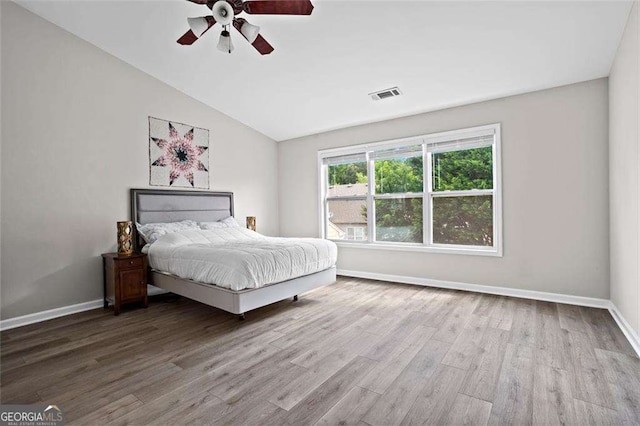 1786 Jameson Cir, Lawrenceville, GA 30043 - bedroom with wood finished floors, lofted ceiling, and ceiling fan