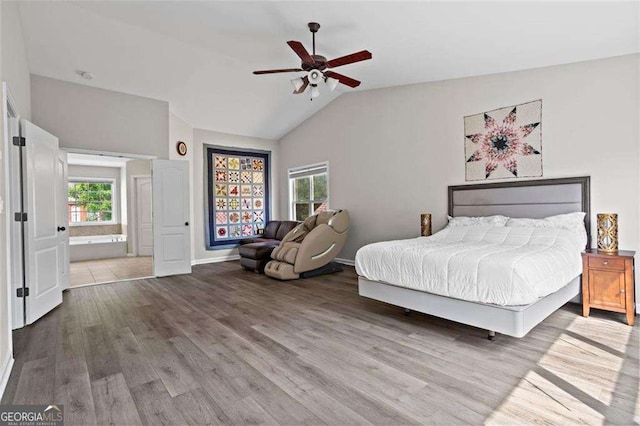 1786 Jameson Cir, Lawrenceville, GA 30043 - bedroom with wood finished floors, lofted ceiling, and ceiling fan