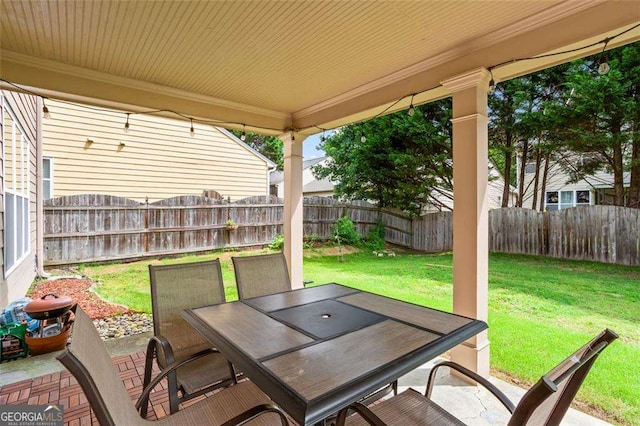 1786 Jameson Cir, Lawrenceville, GA 30043 - fenced backyard featuring outdoor dining space and a patio area