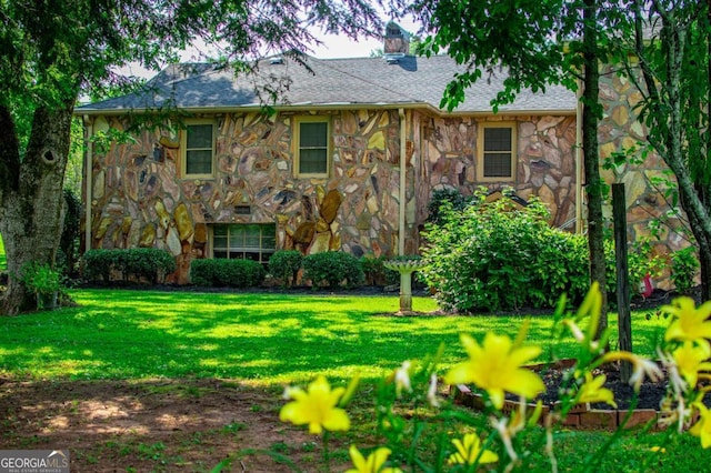 508 College St, Bowdon, GA 30108 - view of front of property with stone siding, a front lawn, and a chimney