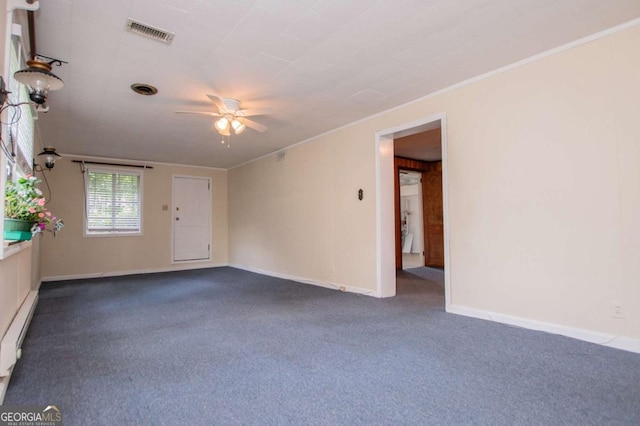508 College St, Bowdon, GA 30108 - carpeted empty room featuring a ceiling fan, crown molding, and a baseboard radiator