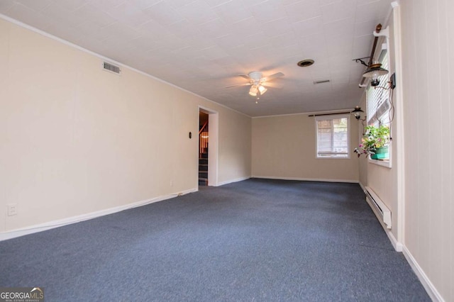 508 College St, Bowdon, GA 30108 - unfurnished room featuring a baseboard heating unit, a ceiling fan, dark carpet, and crown molding