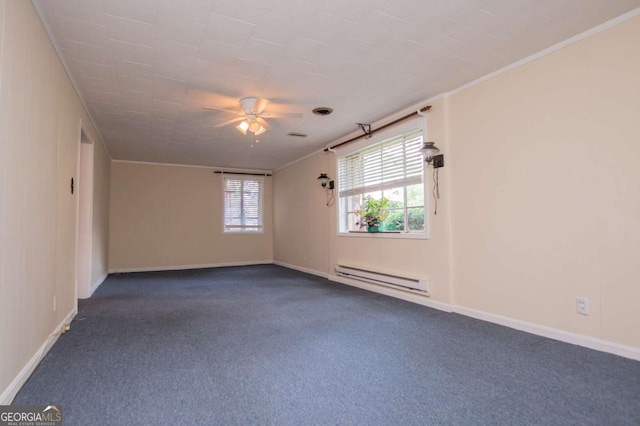 508 College St, Bowdon, GA 30108 - empty room with a baseboard heating unit, dark carpet, a ceiling fan, and ornamental molding