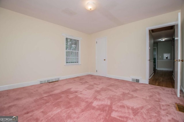 508 College St, Bowdon, GA 30108 - carpeted empty room featuring baseboards