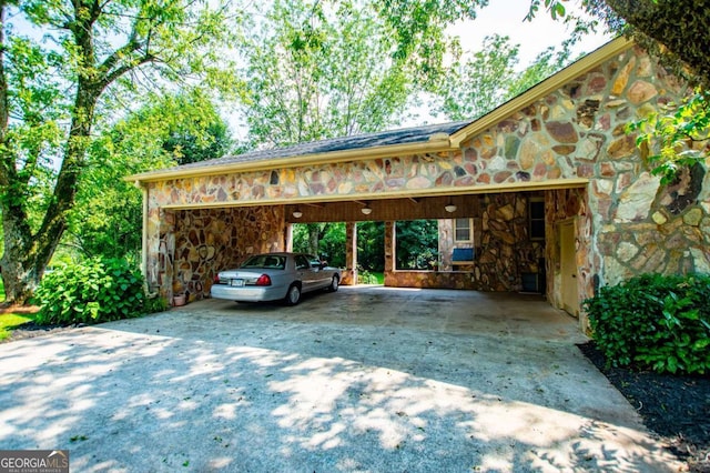 508 College St, Bowdon, GA 30108 - view of parking featuring driveway and an attached carport